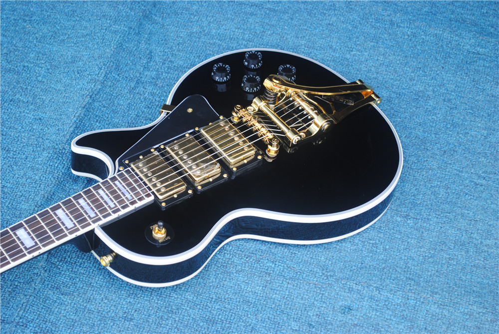 Wholesale high quality custom shop black electric guitar rosewood finger. Golden hardware, golden jazz 3 pickup , Free shipping