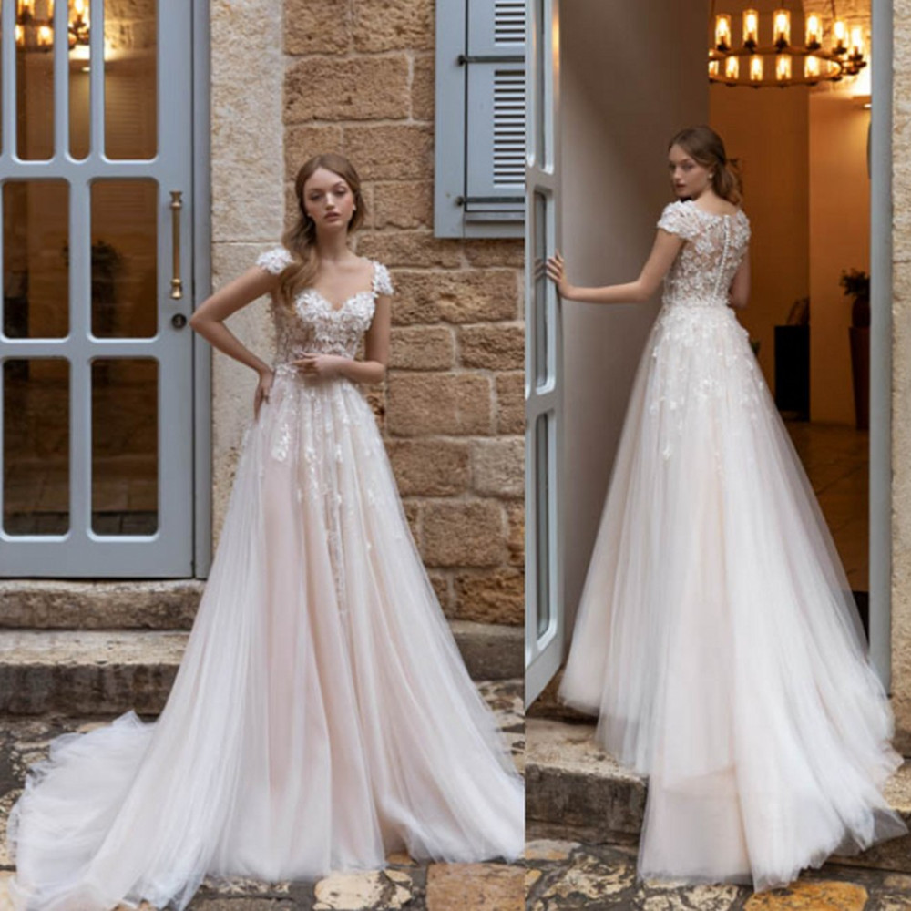 

Daria Karlozi Wedding Dresses V Neck Capped Sleeves Lace Appliques Bridal Gowns 2020 Button Back Sweep Train A-Line Wedding Dress, Same as image