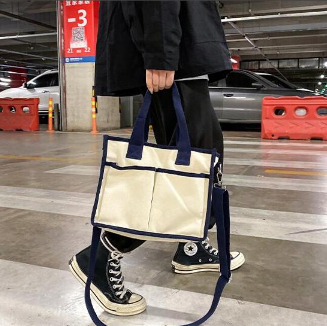 New couple solid color simple casual wild neutral canvas shoulder bag Japanese ins hit color retro student diagonal handbag three-color