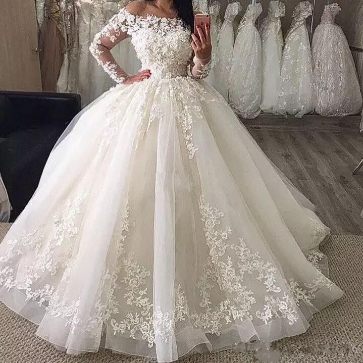 

Spring 2020 Big Puffy Ball Gown Wedding Dresses Off The Shoulder Neckline Sheer Long Sleeves Beautiful Lace and Tulle Bridal Gowns Customize, White