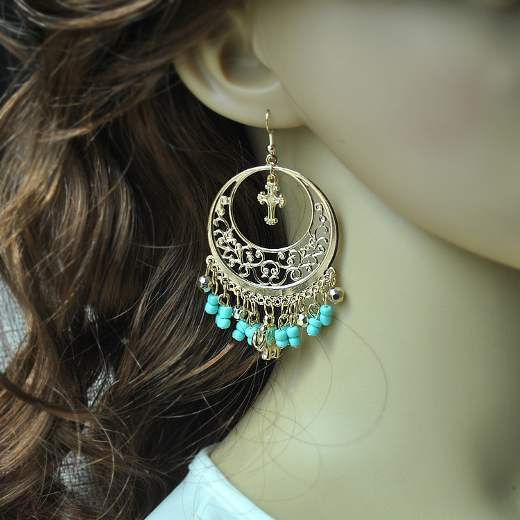 

Exaggerated big circle small rice beads tassel earrings Italian national style hollow carved earring