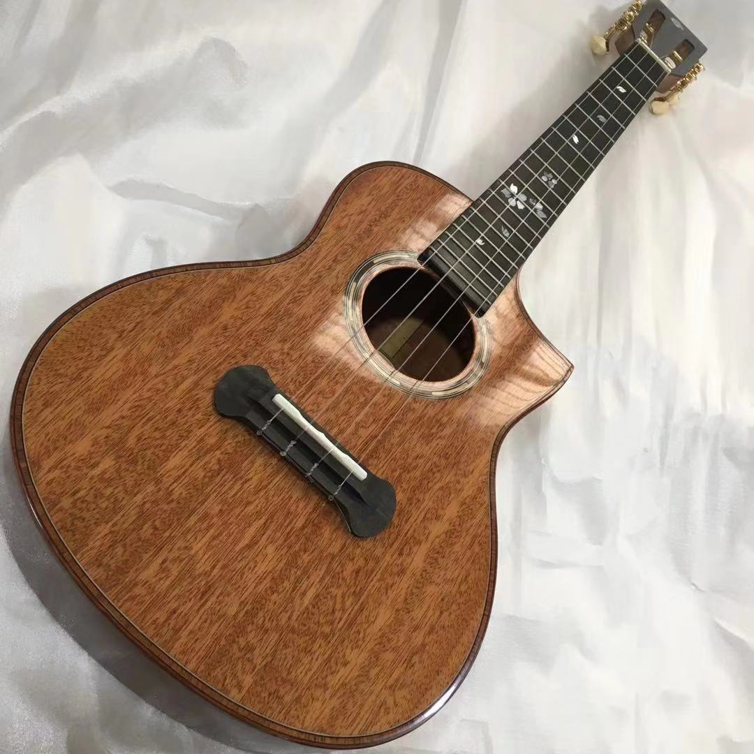 

26 inches, Ukulele, peach blossom core panel. Side panel. Peach blossom core wood on back plate. Free freight.