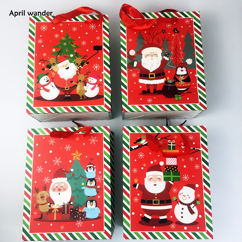 

4pcs/lot Lovely Santa Claus printed bag Christmas party bags Xmas Handbags Paper Gift Bags for Merry Christmas Party Supplies