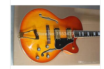 

Free shipping hot new wholesalcustom golden hollow jazz electric guitar pickups big rocker guitar