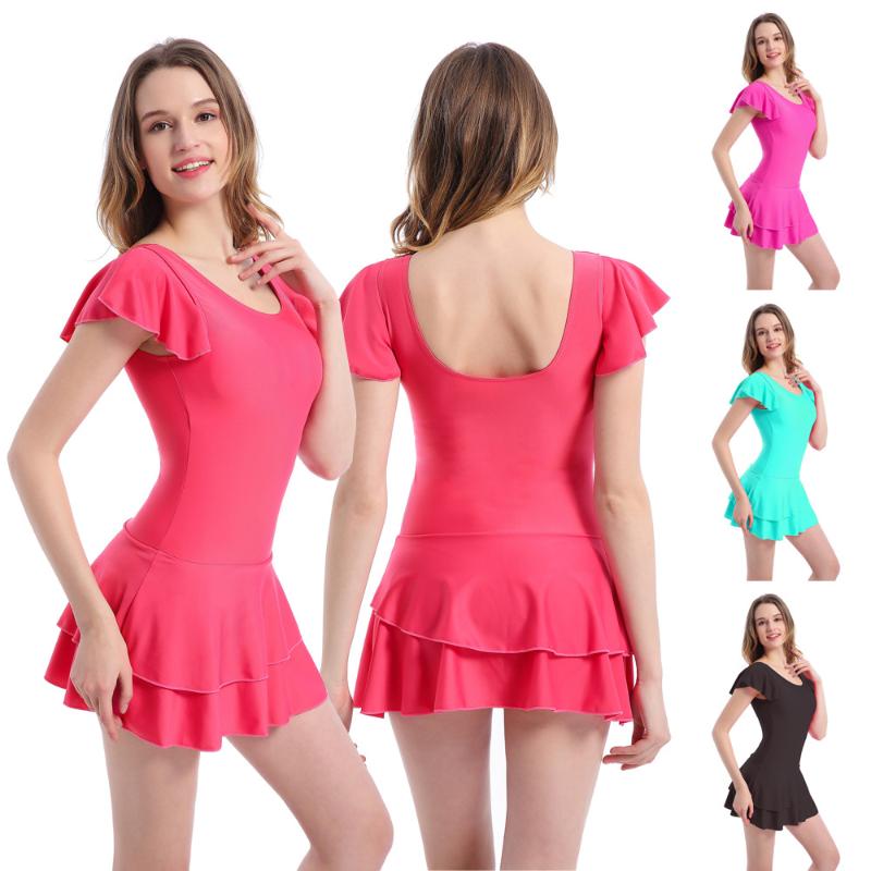 

Beach swimsuit in short-sleeved dress swimsuit is conservative, sexy and oversize, which covers a woman's stomach