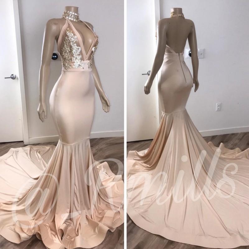 2020 New Sexy Mermaid Prom Dresses Halter V Neck Lace Crystal Beaded Sleeveless Champagne Open Back Sweep Train Evening Wear Party Gowns