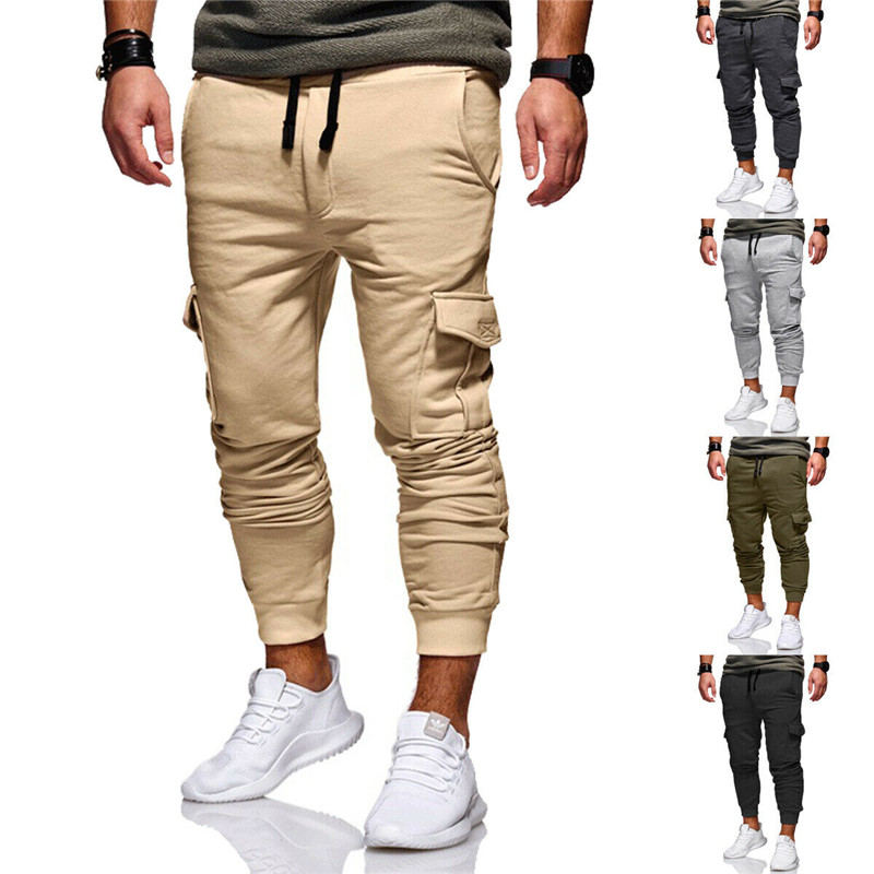 Arrivée Pantalons de cargaison Men Pockets Joggeurs à fermeture à glissière solides Homme pantalon de survêtement décontracté pour hommes plus ta