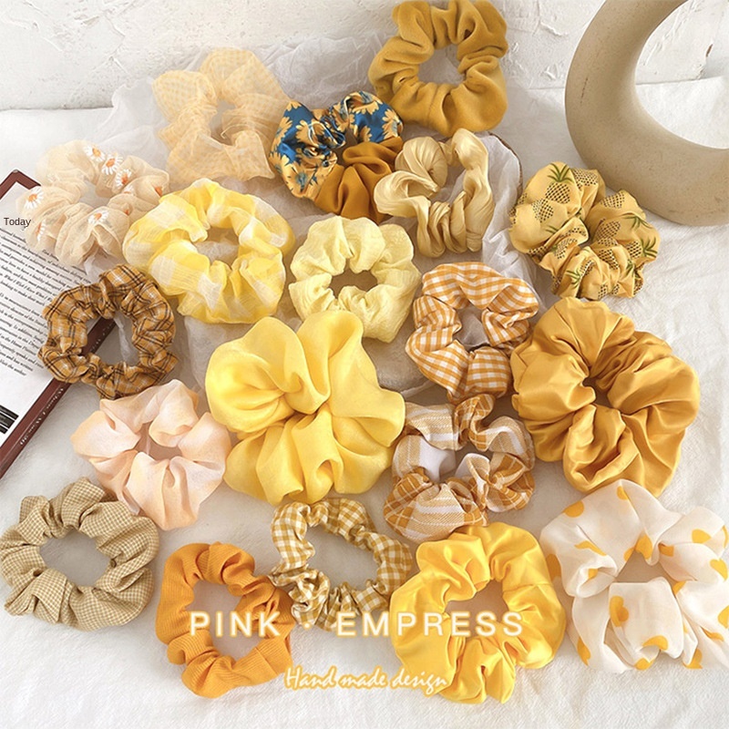 

Gentle yellow pig large intestine hair ring female girl cute fat sausage head rope ins style French simple headwear