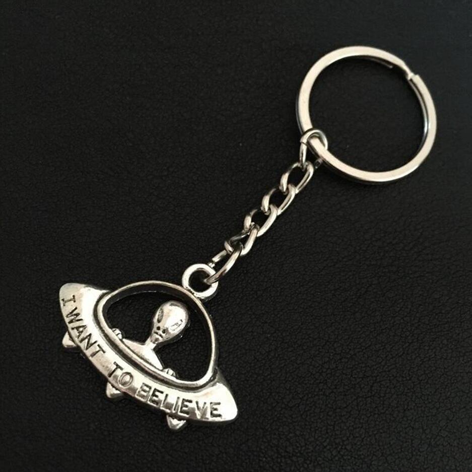 

Personality Antique Silver I want to believe UFO Keychain ET Alien Keyring Spaceship Key Chain Ring Car Purse Pendant Jewelry 828