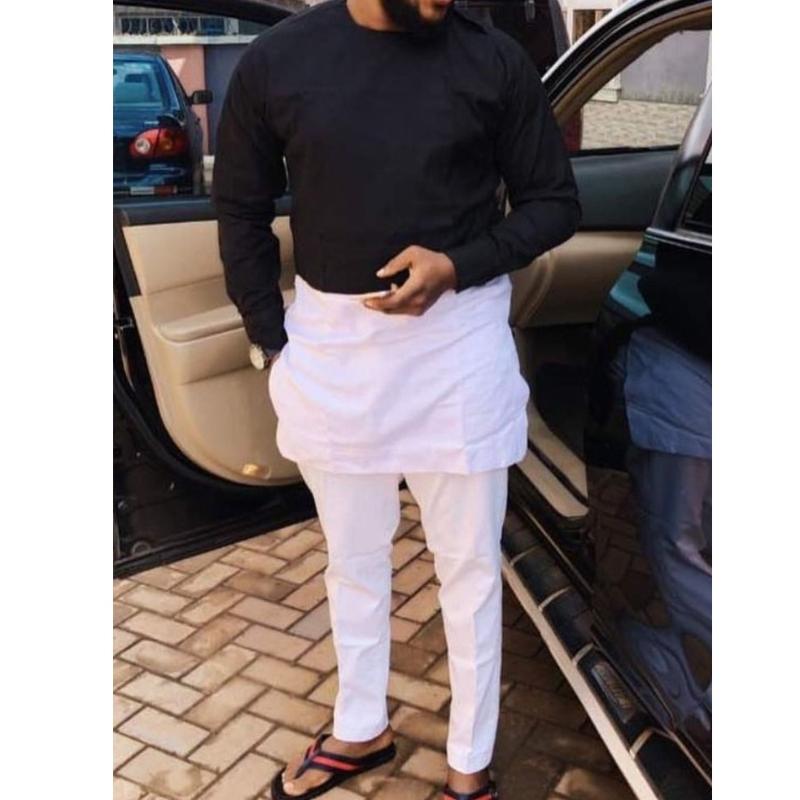 pantalon negro camisa blanca hombre