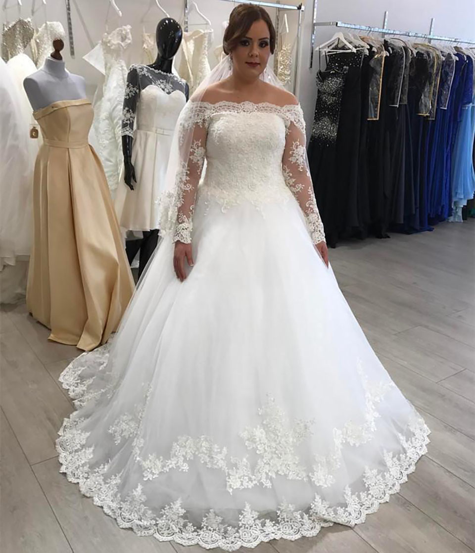 Robes de mariée grande taille une ligne nouvelle hors de l'épaule longueur de plancher à manches longues en dentelle appliques robe de mariée rob