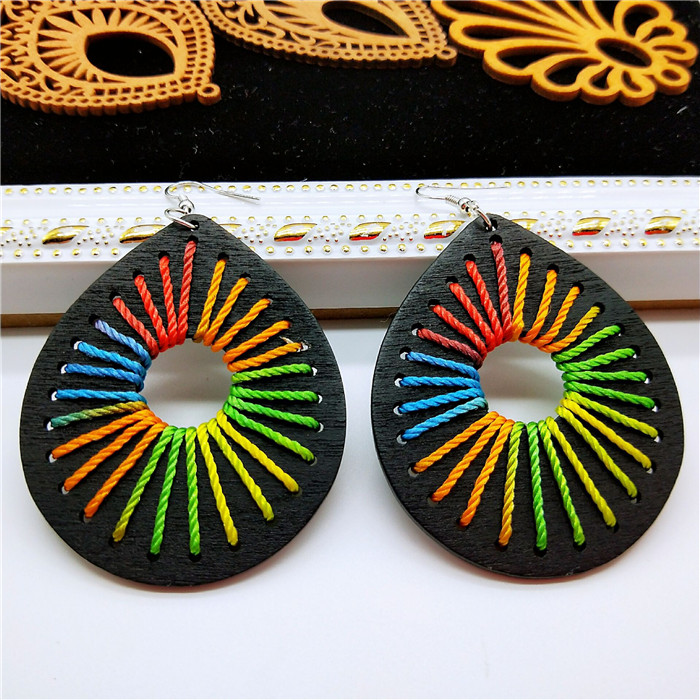

Influx earrings female Korean personality simple retro wood envelope line fat water drops wooden geometric earrings