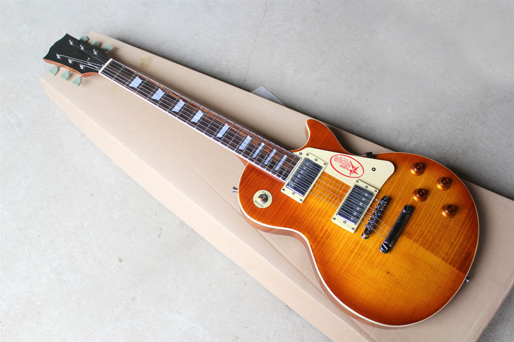 

Custom Honey Burst body Electric Guitar with Flame Maple Veneer,Chrome hardware,Fixed bridge,Body binding,can be customized