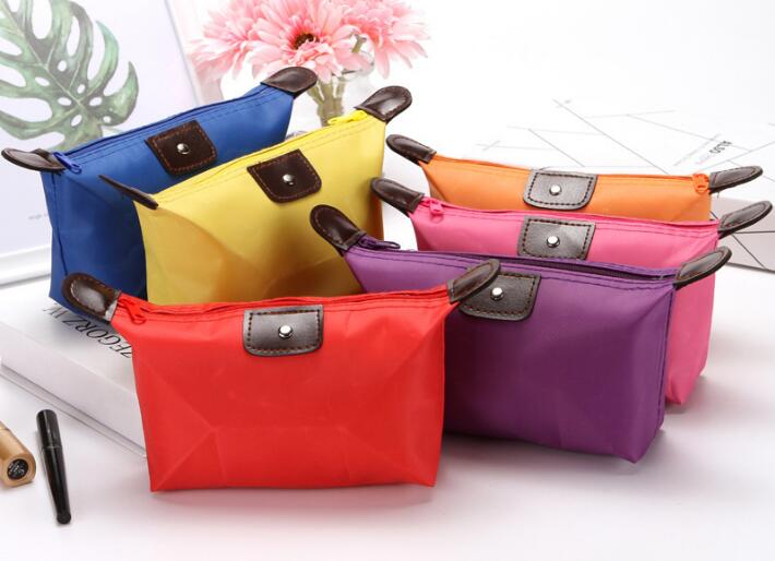 

Top Quality Lady MakeUp Pouch Waterproof Cosmetic Bag Clutch Toiletries Travel Kit Casual Small Purse Candy Sport 10 Colors 2019, Same as pics