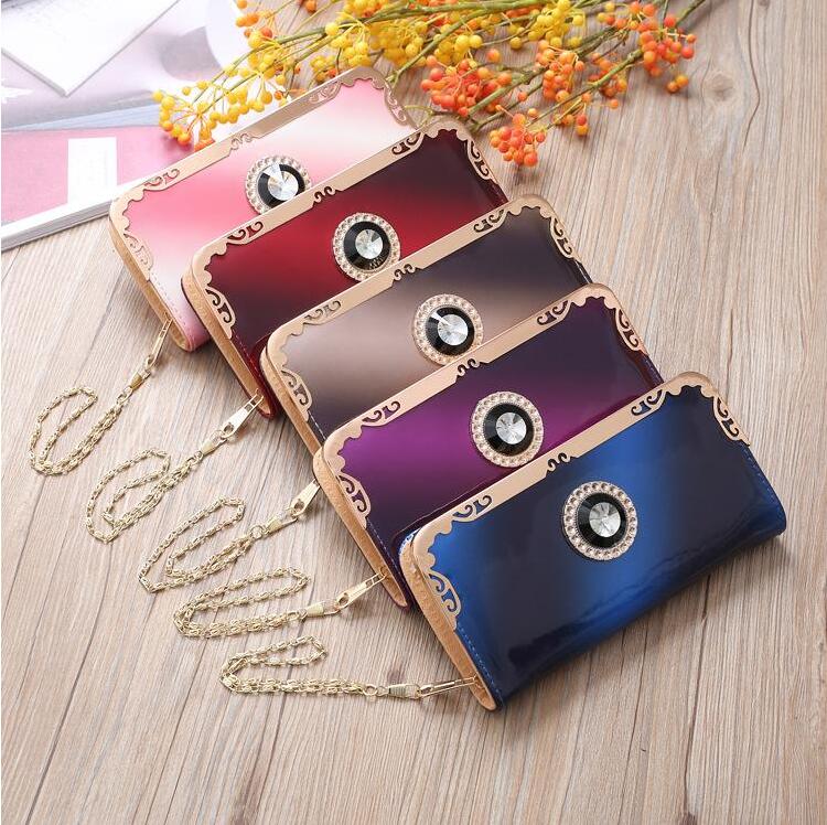 

Factory wholesale brand women handbag elegant atmosphere leather wallet color fashion long wallet multi-functional striped coin purse, Red;black