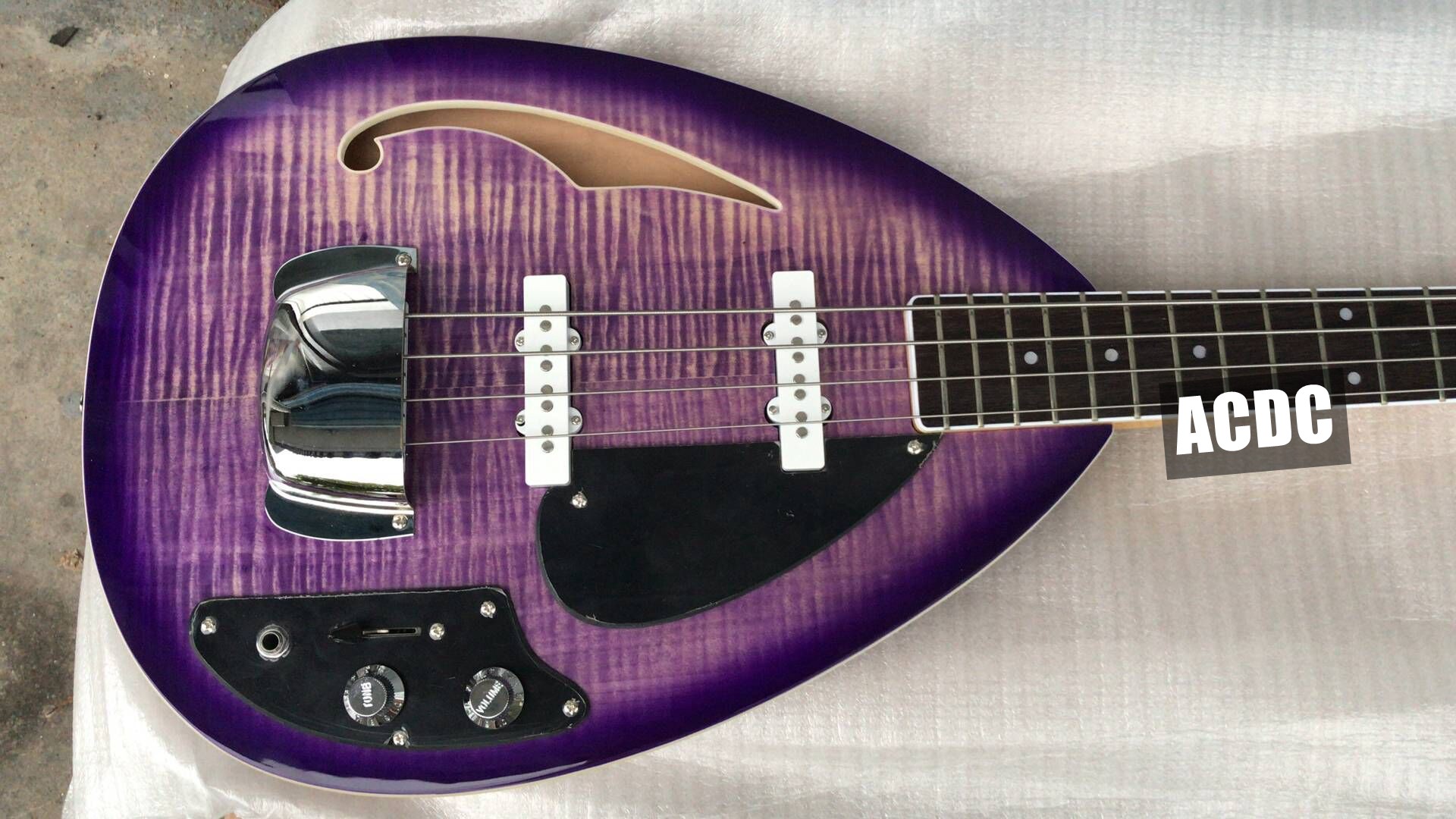 

4 Strings Trans Purple Flame Maple Top Tear Drop Electric Bass Guitar Semi Hollow Body, Single F hole, Chrome Tailpiece Cover