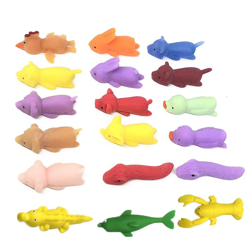 small plastic toy chickens