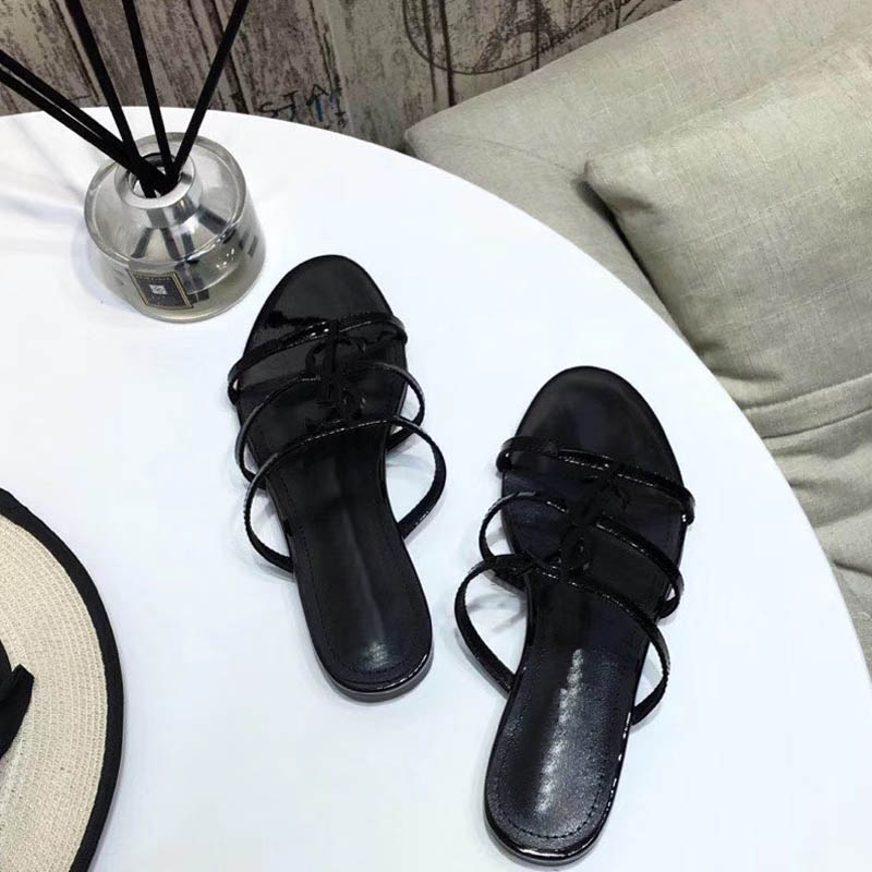 

Free Shipping 2019 new Europe and US summer cool slippers new fashion bow sandals beach sandals decorated with rivets, Black