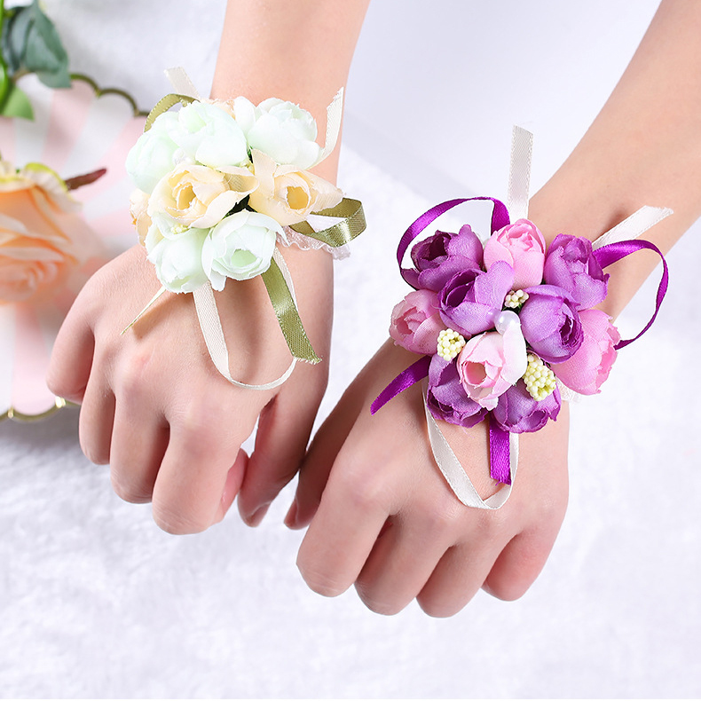 

Wedding supplies wedding Bride bridesmaid wrist flower Korean imitation Artificial cloth pearl Corsage sister group hand flower