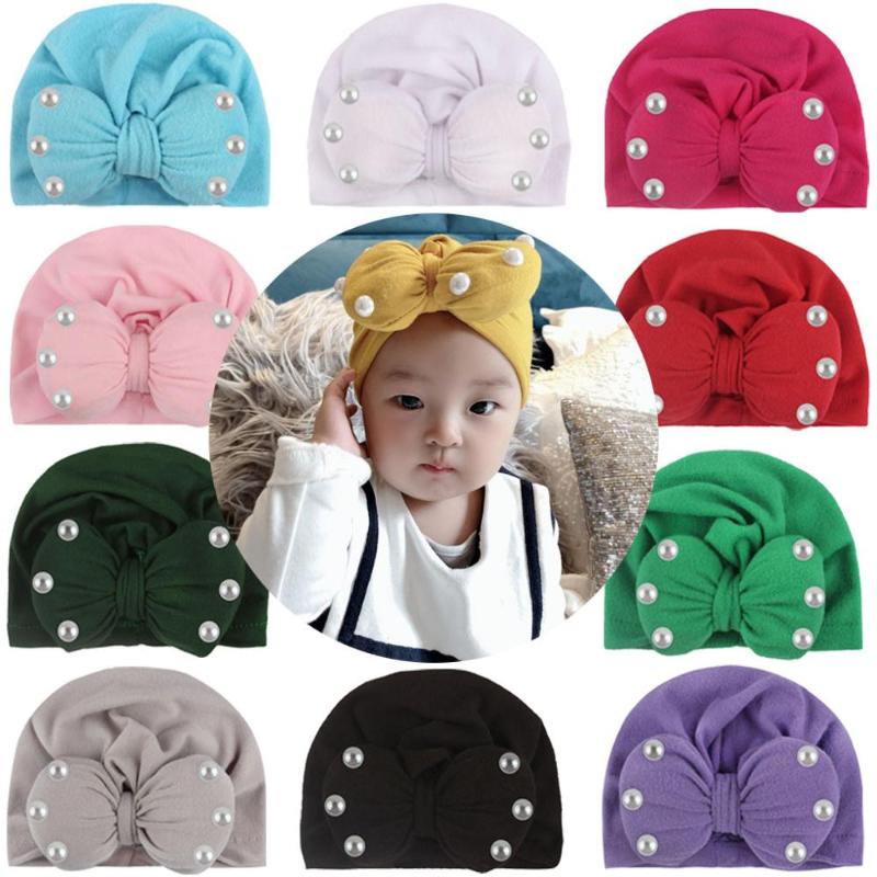 

2020 New Newborn Baby Kids Boys Girls Soft Turban Cap Beanie Solid Bow Knot Wrap Hats 11colors Lovely Beanis Baby Gifts