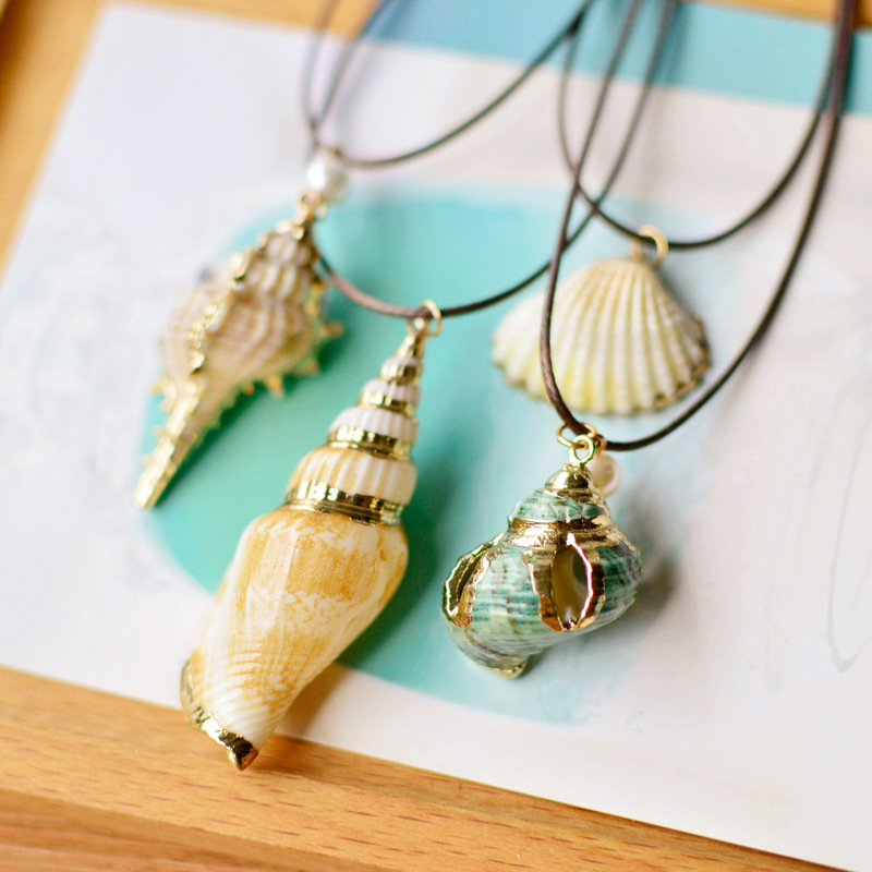 

Cute Gold rim ocean conch shell Pendant Sweater Leather rope Necklace Women Fashion Charm Jewelry Accessories wholesale