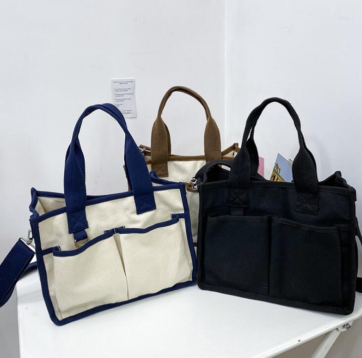 2020 new neutral Korean solid color simple casual wild canvas shoulder bag Japanese ins hit color retro student diagonal handbag