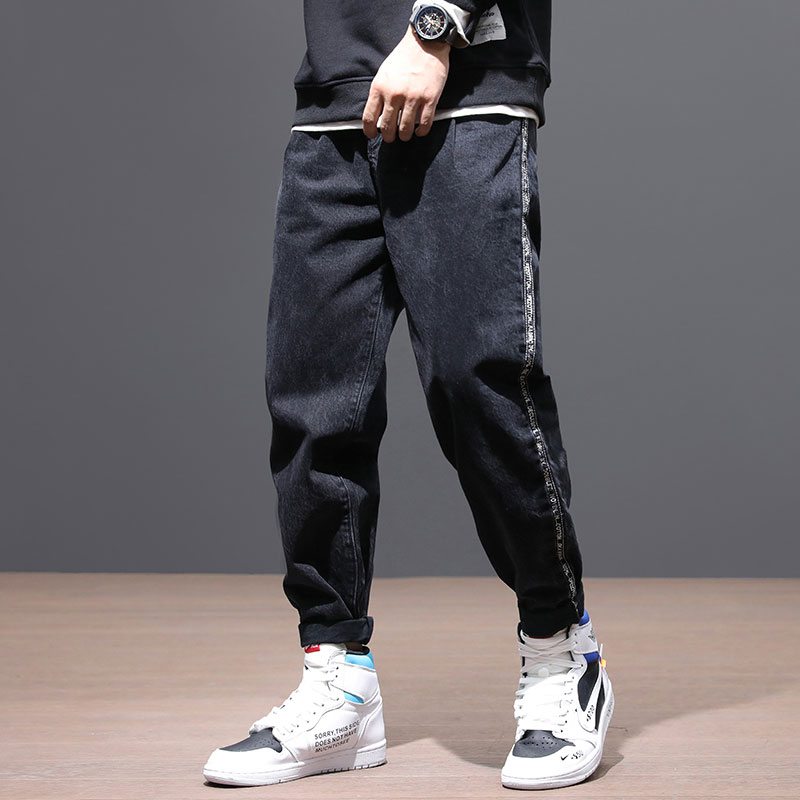 

Fashion Streetwear Men Jeans Black Color Stripe Designer Elastic Harem Pants Loose Fit Taper Trousers Korean Hip Hop Jeans Men