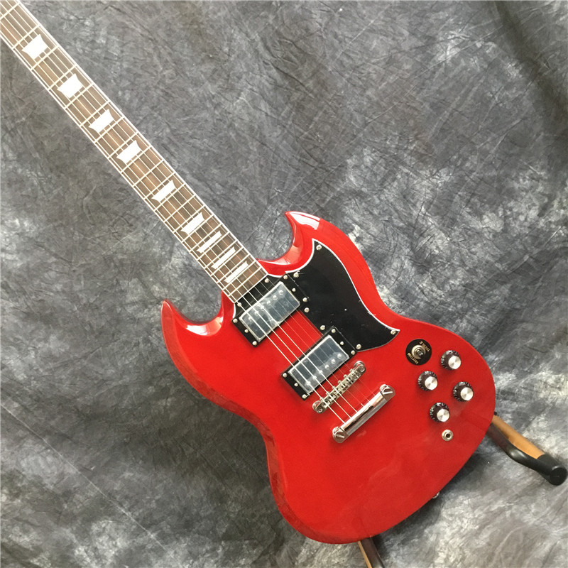 

sg electric guitar, mahogany body, red flame maple chrome hardware, ing