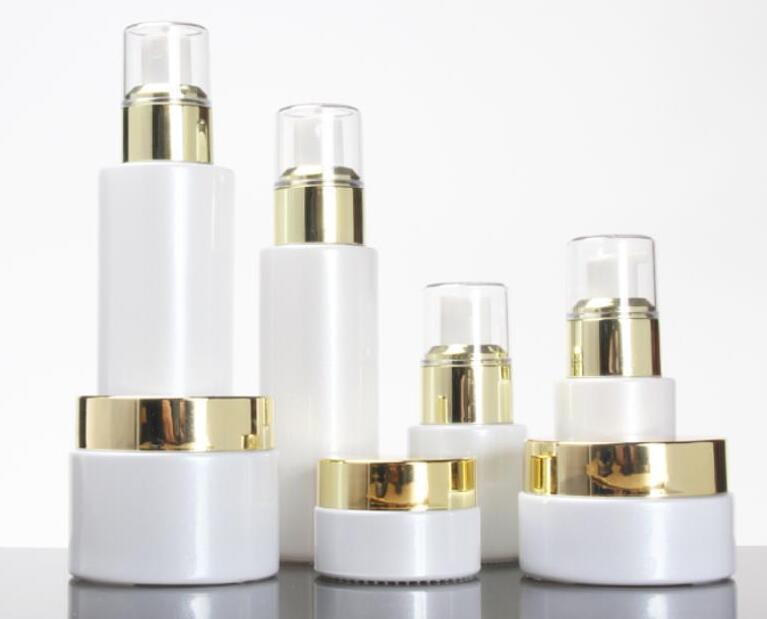 

Empty 30/50g white glass jar 20/30/100ml white glass pump lotion/spray bottle gold collear lids