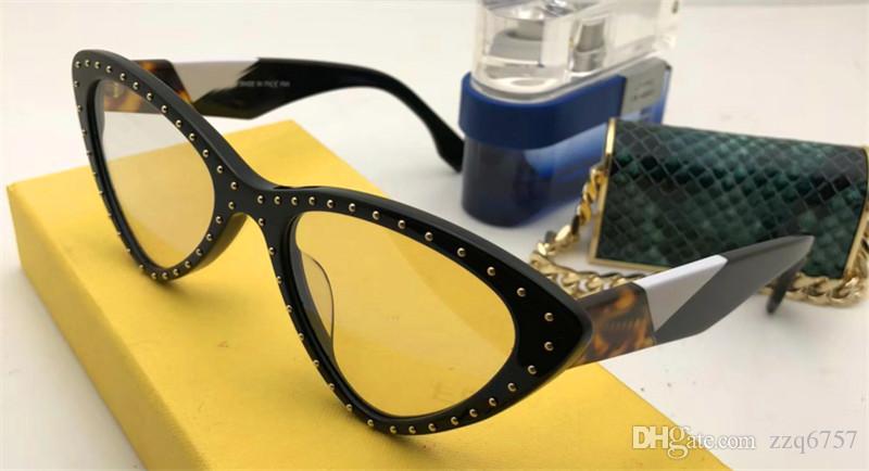 

2018 new fashion designer sunglasses 0323 small charming cat eye frame with rivet stitching color legs top top quality popular style, White;black