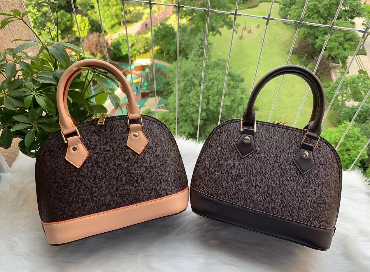 

Free shipping brand new Women's Bags European and American fashion designer shell bag PU gold chain / a large number of discounts, Old flower