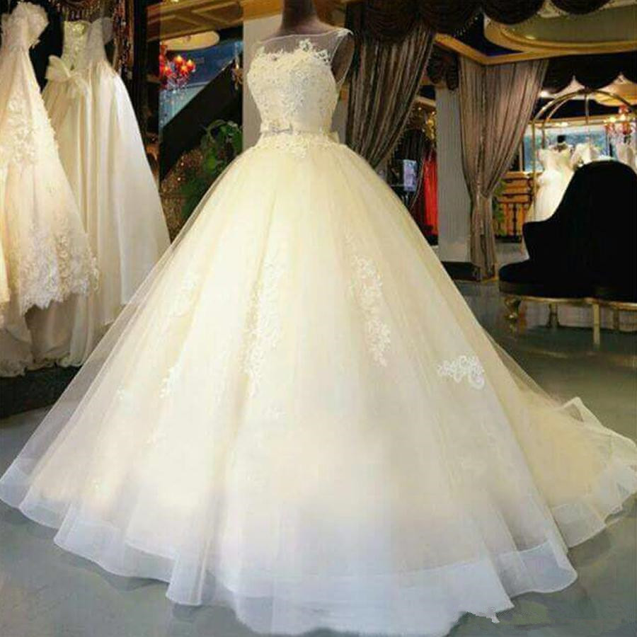 

2020 New Beautiful A-Line Sleeveless Tulle Wedding Dresses Illusion Neckline Appliques Elegnat Bridal Gowns Custom Made Court Train 85, Gold