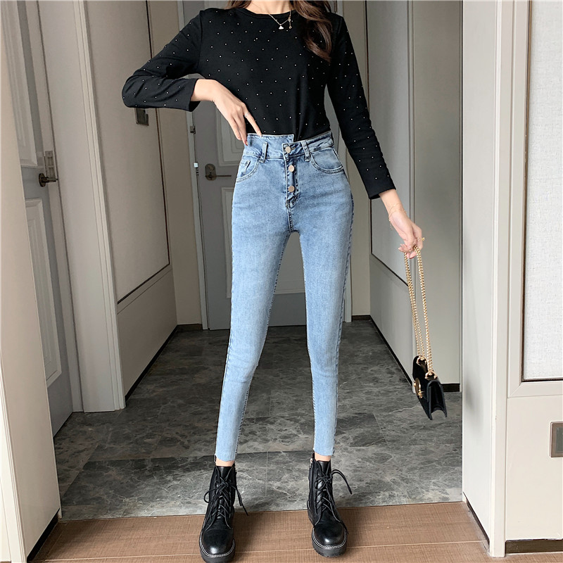 

Asymmetrical high-waisted jeans with three buckles make them slim and stretch them with nine points and small legs, Blue