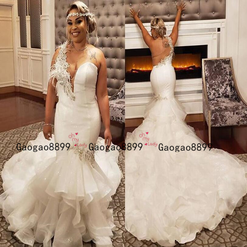 lace mermaid wedding dress with feather skirt