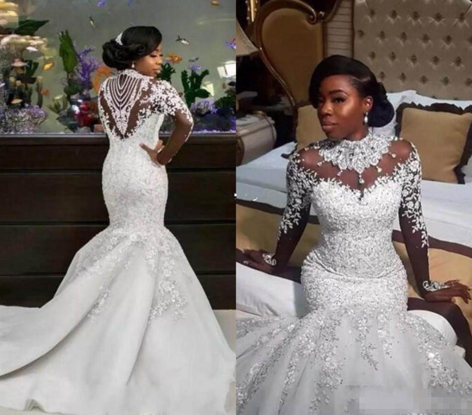 

Luxury Beaded Mermaid Wedding Dresses with Sheer Long Sleeve High Neck Crystal Chapel Train African Arabic Plus Size Bridal Gowns 2020, White