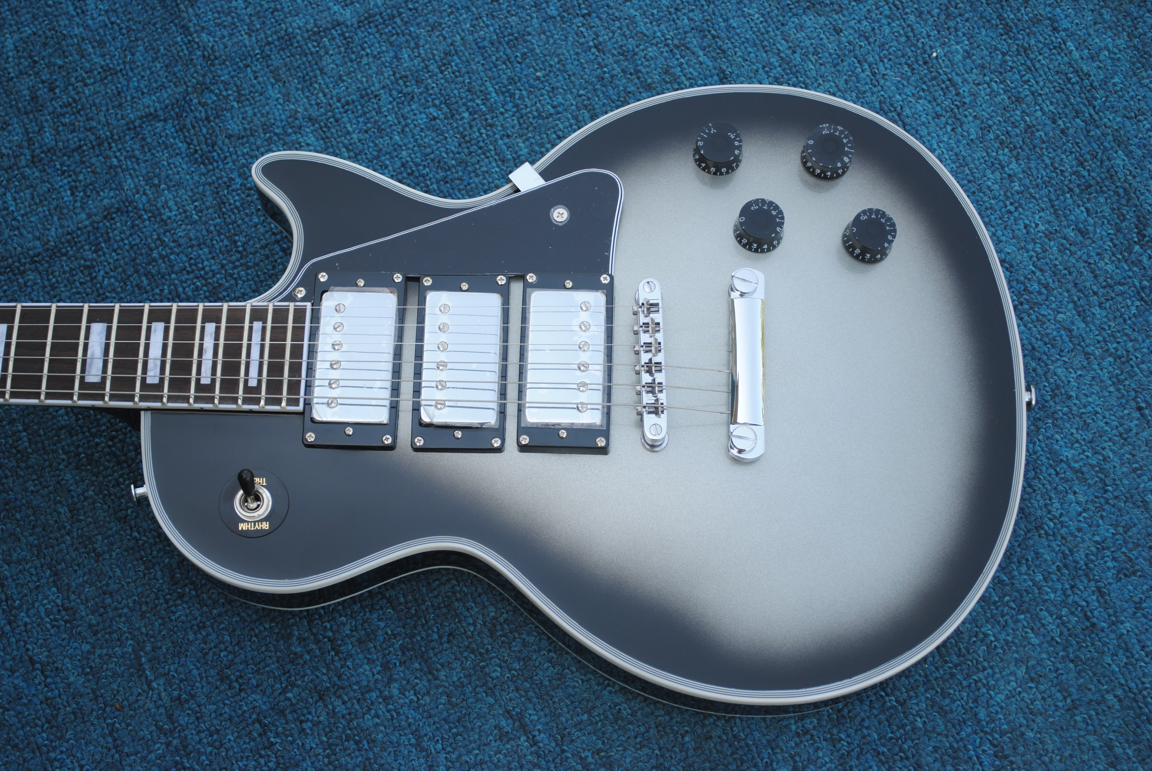 Factory ordered silver and black electric guitar, chrome hardware, rosewood fingerboard, electric guitar, 3 pickups , free shipping