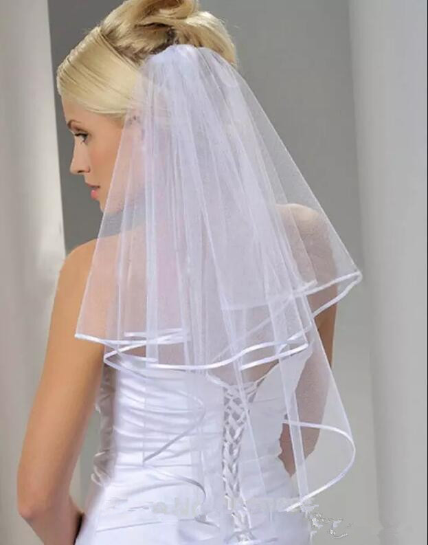 

In Stock Cheap Tulle White Bridal Veils 2019 with Comb Elbow Length Two Layer Ribbon Edge Wedding Accessories New Arrival, Ivory