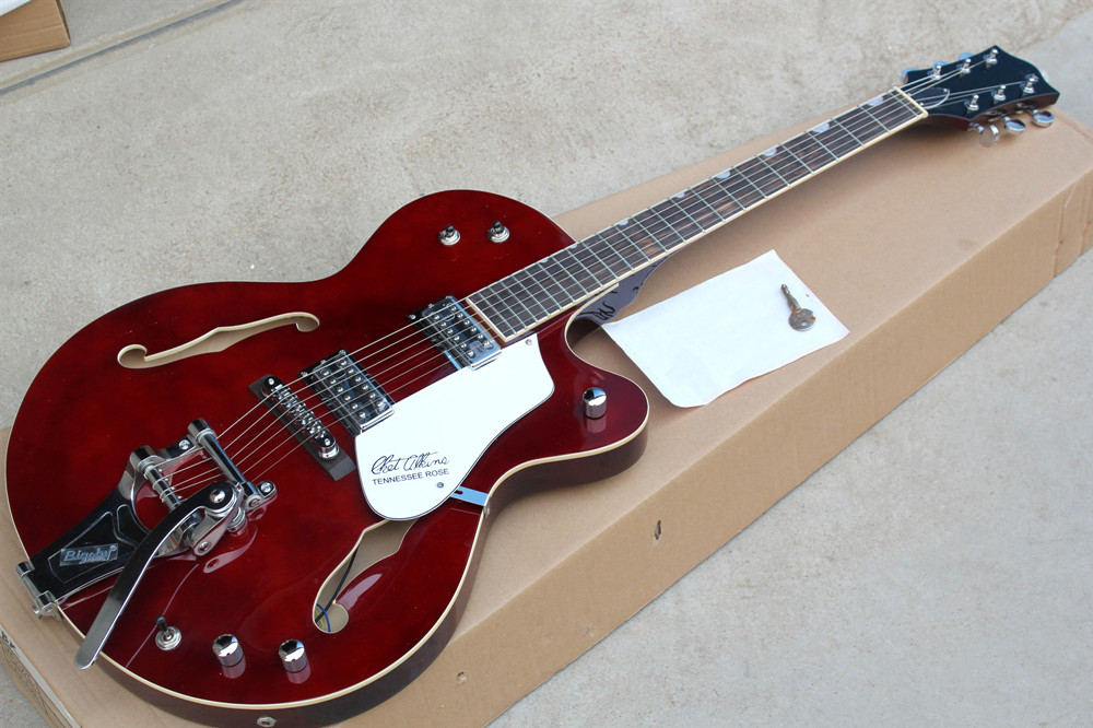 

Factory Custom Rosewood Fingerboard Semi-hollow Electric Guitar with Chrome hardware,Tremolo bridge,White pickguard,can be customized