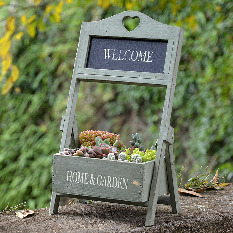 

Antique Green Foldable Footed Wooden Flower Shelf With White Welcome Letter Printed On European Home Garden Decor Flower Planter