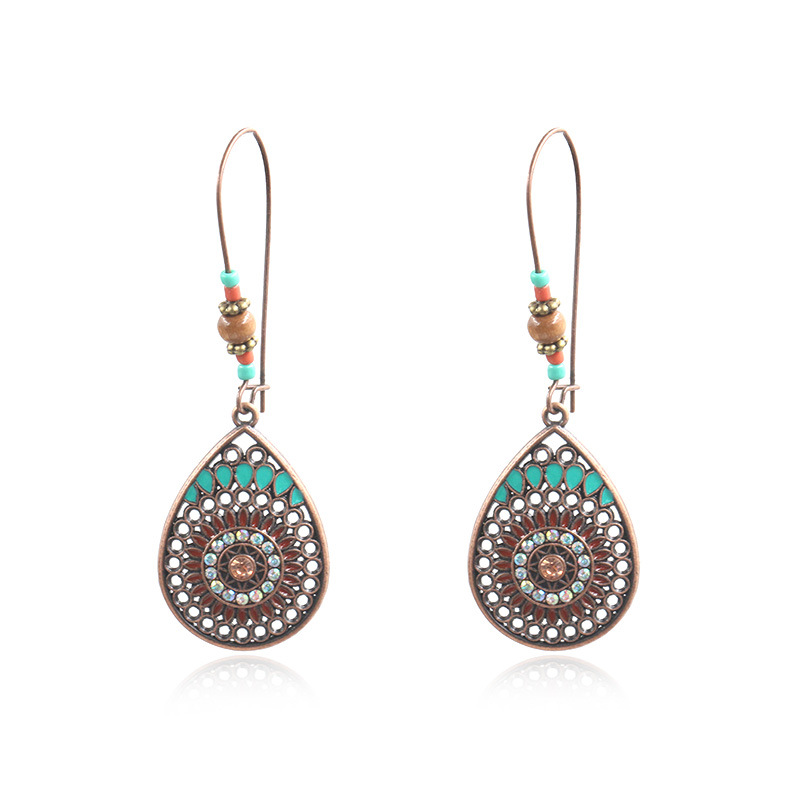 

Bohemian Ethnic Style Fashion Individual Explosion Jewelry Hollow Water Drop Alloy Oil Drop Long Earrings Earrings 1267