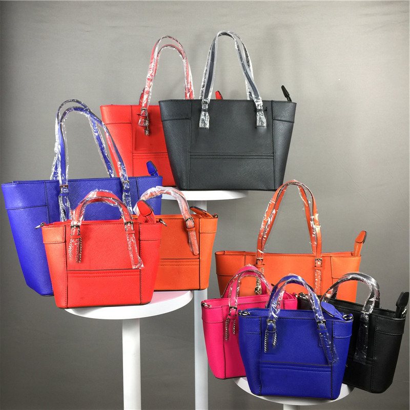 navy and cream handbags
