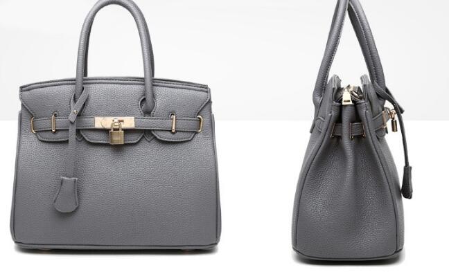 

Designer-Wholesale- New Original Fashion Orange Top High Quality Luxury Lock Designer Handbags Real Women Bag Evening Bags Totes, Black