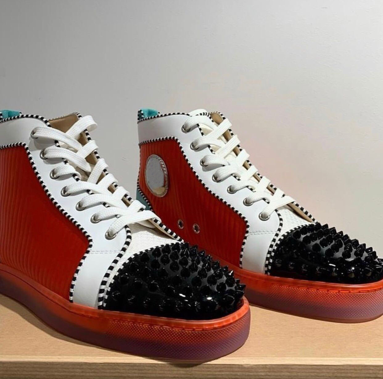 red button sneakers