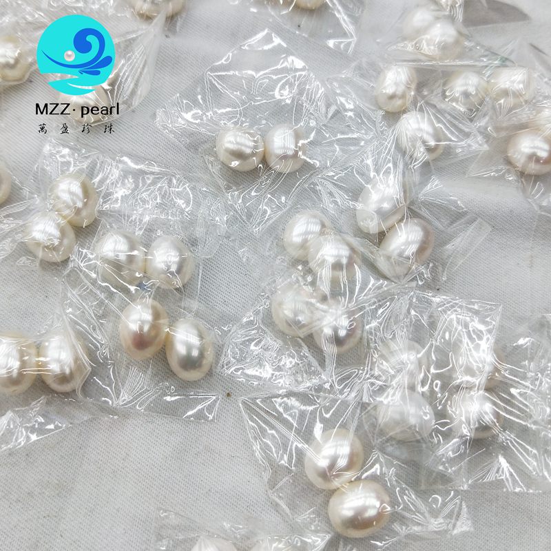 

large drop shape pearl beads in pairs