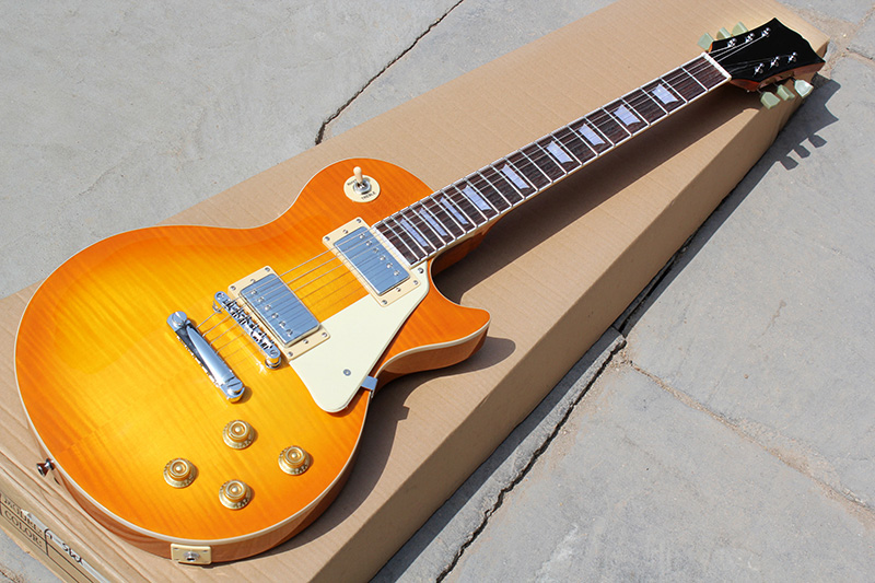 

Factory Custom Orange Electric Guitar with Chrome Hardware,White Pickguard,White Binding,HH Pickups,Offer Customized