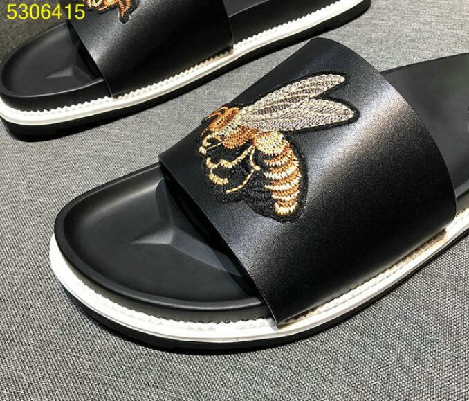 

Real leather mens Drag slide flip flops slippers snake bees embroidery lazy men slippers Beach sandals 38-44, I know its a copy