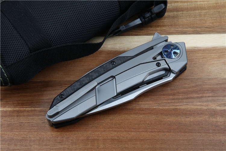 

Hot high-end Zt0999 titanium alloy folding knife m390 steel camping hunting folding knife d2 Art collection knife