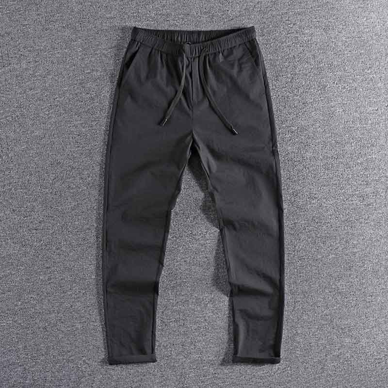 

2020 Pocket decoration summer solid color thin youth drawstring sports pants quick drying men's casual pants slim Leggings 0226, Black