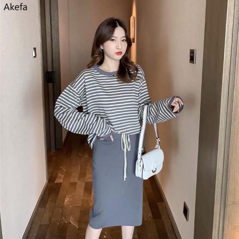 

Knitted suit skirt women 2020 new autumn and winter striped long-sleeved sweater + half-length one-step skirt two-piece suit, Black
