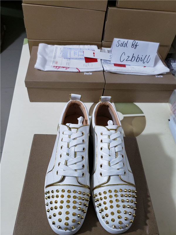 Low-Top White Leather with Gold Spikes